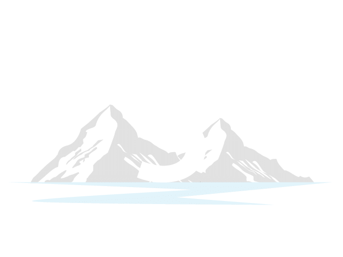 Gray mountain peaks above pale blue water