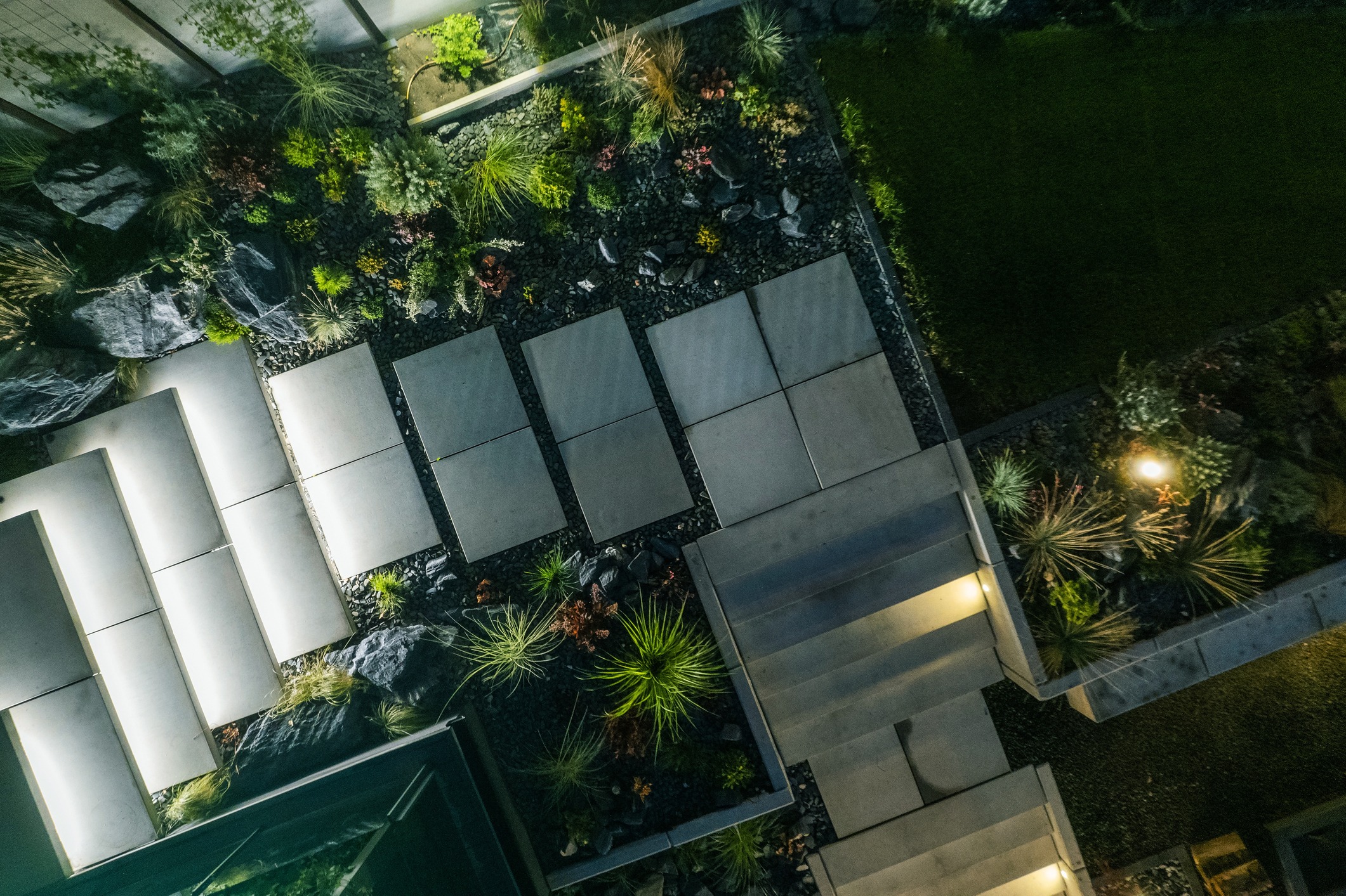 Overhead view of modern garden stairs and stone landscaping